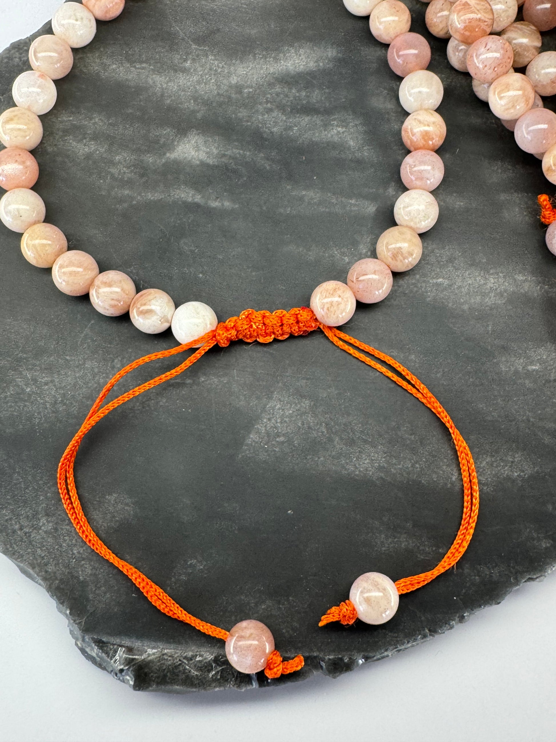 Peach Flashy Moonstone Adjustable Bracelet – 6mm Beads